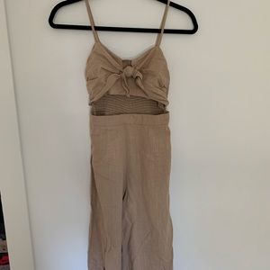 Beige jumpsuit with cutout